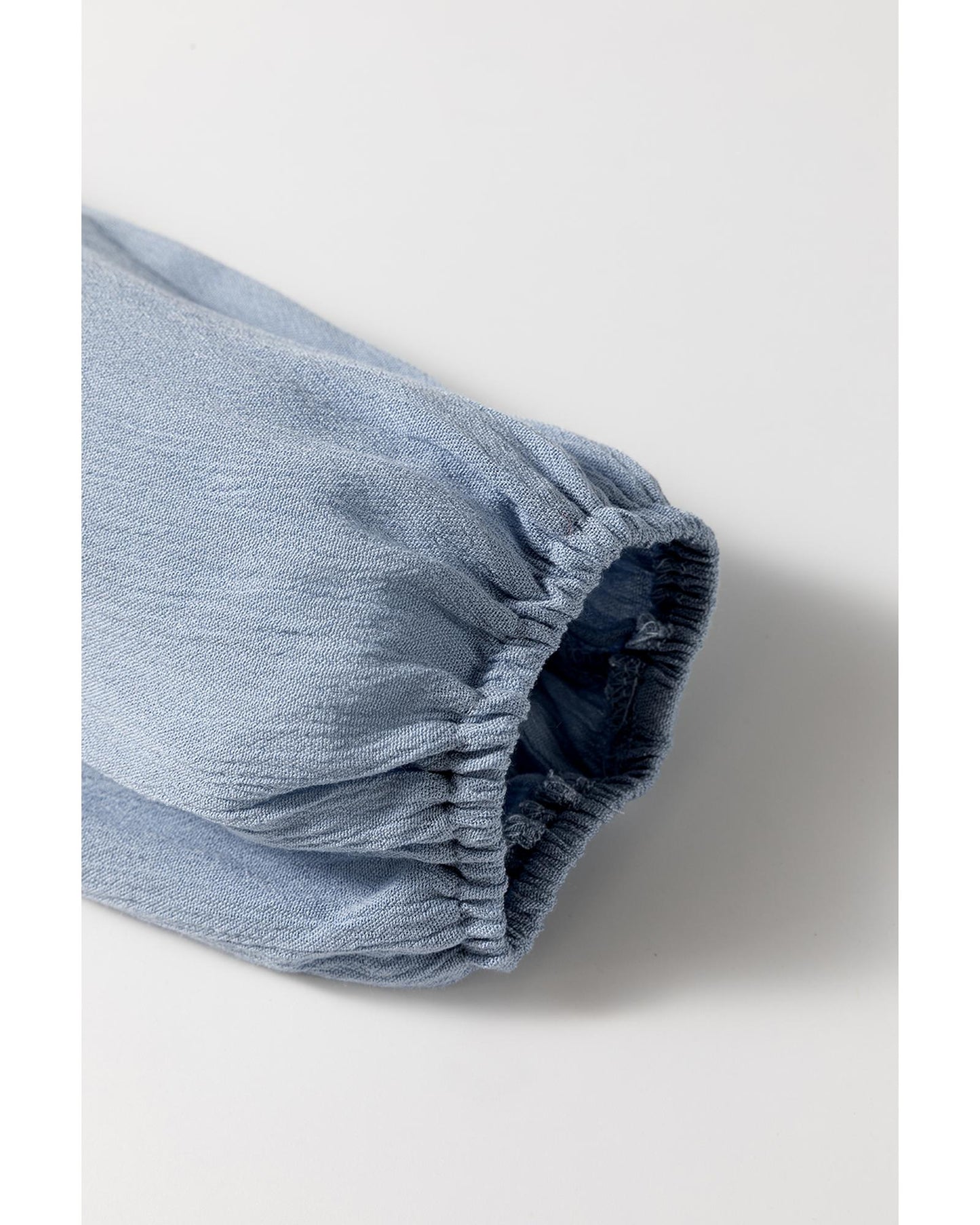 Ashleigh Blue Long Sleeve V Neck Smocked Tiered Mini Dress - S